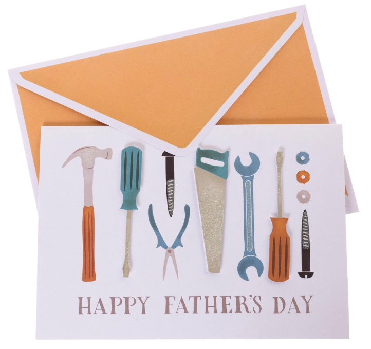 Handmade Father's Day greeting card with glitter tool illustrations and Happy Father's Day text, shown with a kraft envelope.