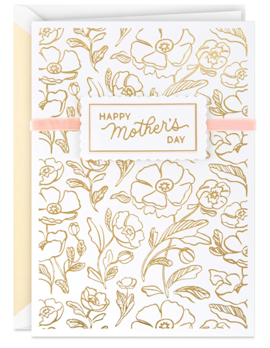 Hallmark Signature Mother's Day greeting card with gold foil floral pattern, pink ribbon, scalloped plaque, and Happy Mother's Day text, shown with a matching envelope.
