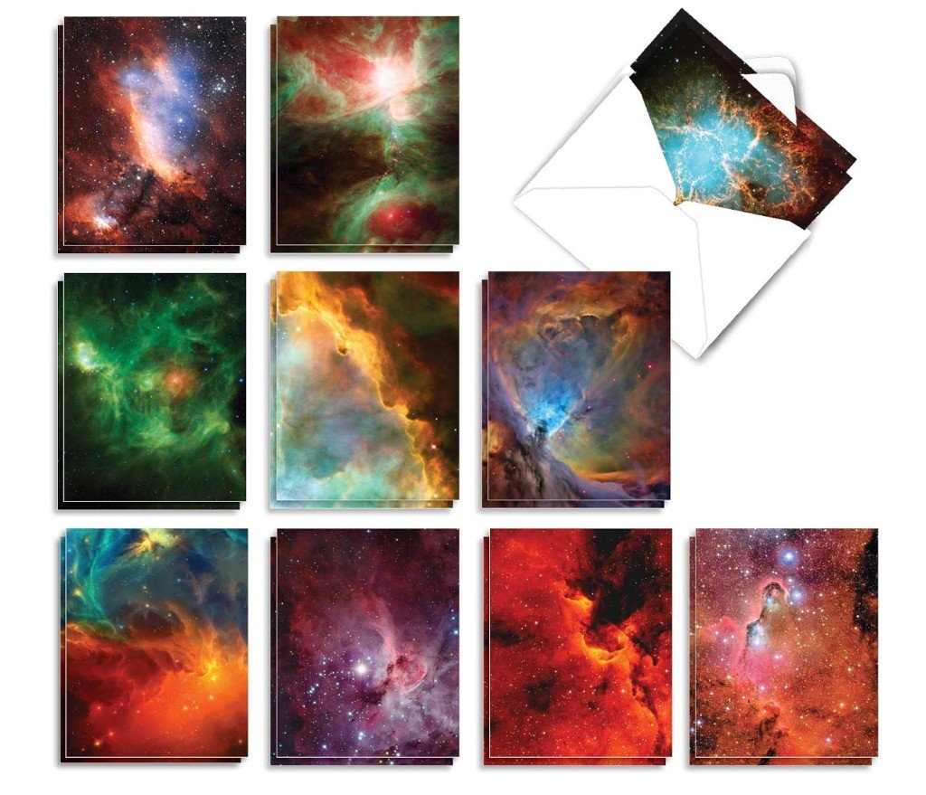 Twenty-pack galaxy blank note card set with colorful nebula and Milky Way space photography in ten unique designs, shown with white envelopes.